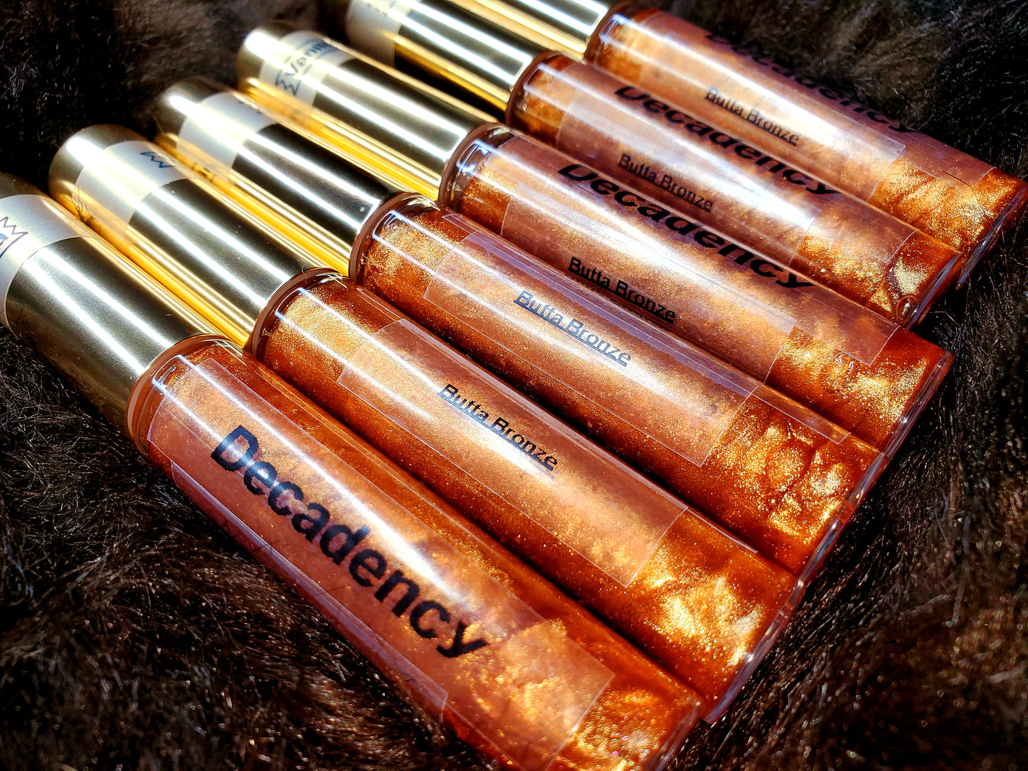 Decadency Lip Gloss “Butta Bronze”