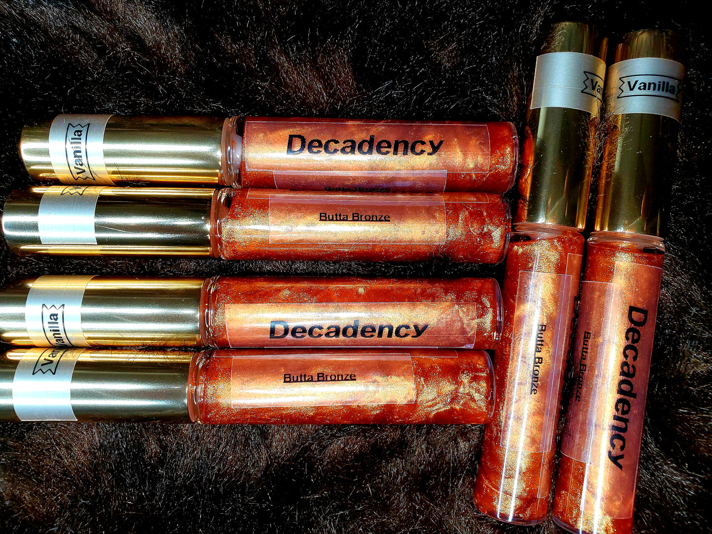 Decadency Lip Gloss “Butta Bronze”